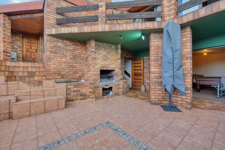 Creating the Ultimate Outdoor Entertaining Space with Custom Decks and Fire Pits